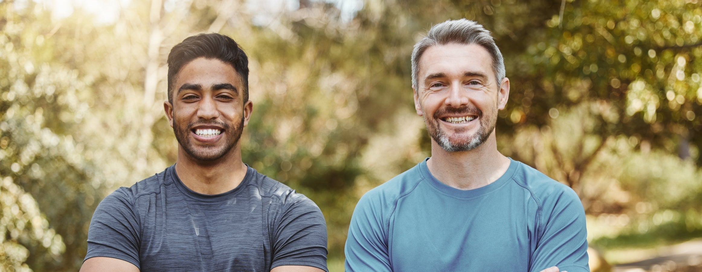 two men smiling companionably