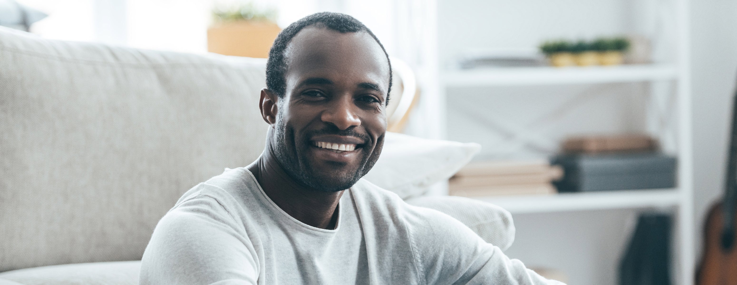 a man smiling into the camera