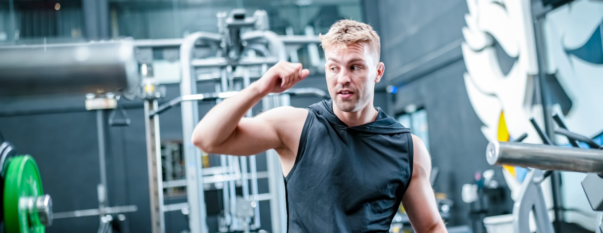 A man doing exercises in a gym